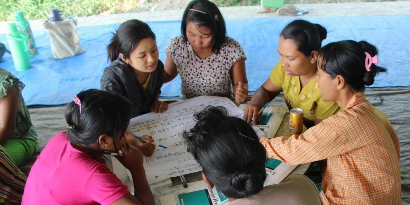 Women discussion, Photo by: Pan Ei Phway Phyu Sin/ Oxfam A group of women are discussing about their concern for the village development, Photo by: Pan Ei Phway Phyu Sin/Oxfam